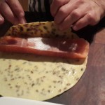 Roll the omelette around the salmon and slice into 2cm thick medallions,