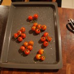 Put the tomato into the oven  grill dressed with origanum, salt, pepper and olive oil at 250 C until soft and subtly chared,