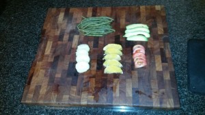 4.	Peel the orange and potato. Slice the orange, potato, avo and tomato into wedges,