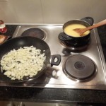 2.	On a medium heat, fry the onion and boil the polenta as per directions on packaging;