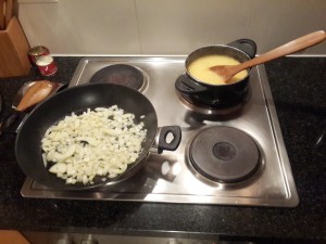 2.	On a medium heat, fry the onion and boil the polenta as per directions on packaging;