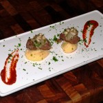 6.	Build layers in order of: polenta first, liver second, mash onions, pinenuts and finish with chopped parsley.