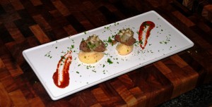 6.	Build layers in order of: polenta first, liver second, mash onions, pinenuts and finish with chopped parsley.