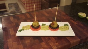 9.	Place the Polpette on top of the mushroom and slide the skewer in.