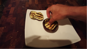 7.	Place an aubergine disk in the base of the hollowed grilled aubergine, to basket the sauce;