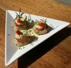 Putut the fillet on the bottom eggs and tomato on top and garnish as you like but don't forget to sprinkle with fresh chopped parsley
