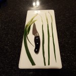 2.	Slice into strips and blanch the leaf of the spring onion, to make it more workable and eatable;