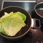 2. Boil the cabbage leaves until quite soft;