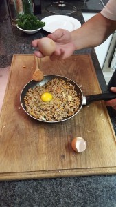 5.	 Once the mince is cooked, take off the stove and break the eggs in, and mix through;