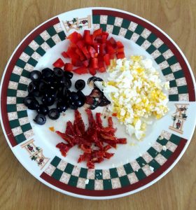 Chop the peppers, olives, eggs and sun dried tomato